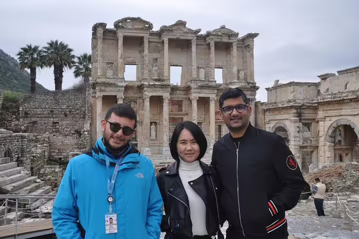 Visitors pose at the iconic Library of Celsus during a private Ephesus tour from Izmir Port.