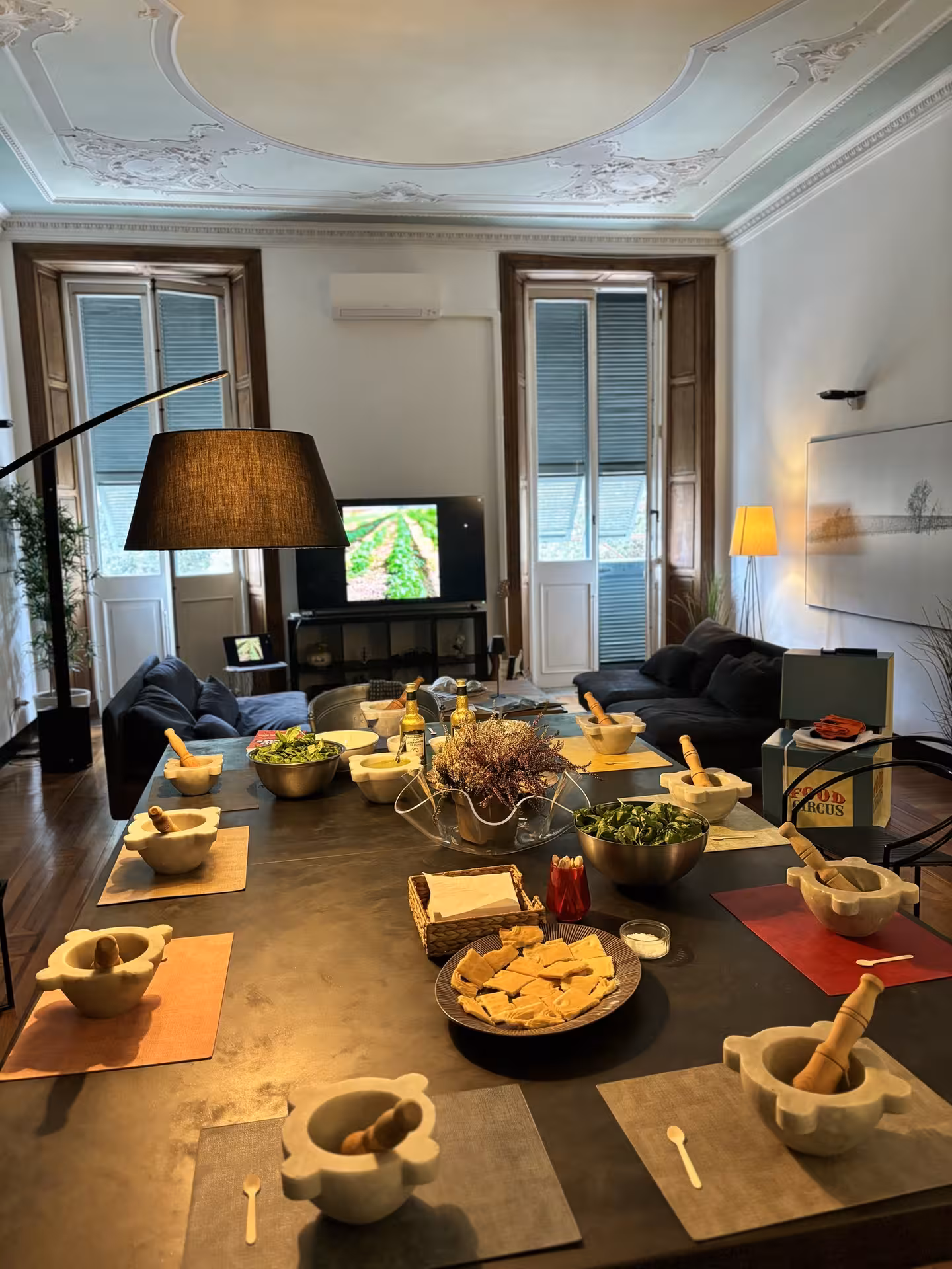 Elegant setup for Ligurian focaccia and wine tasting class with traditional tools.