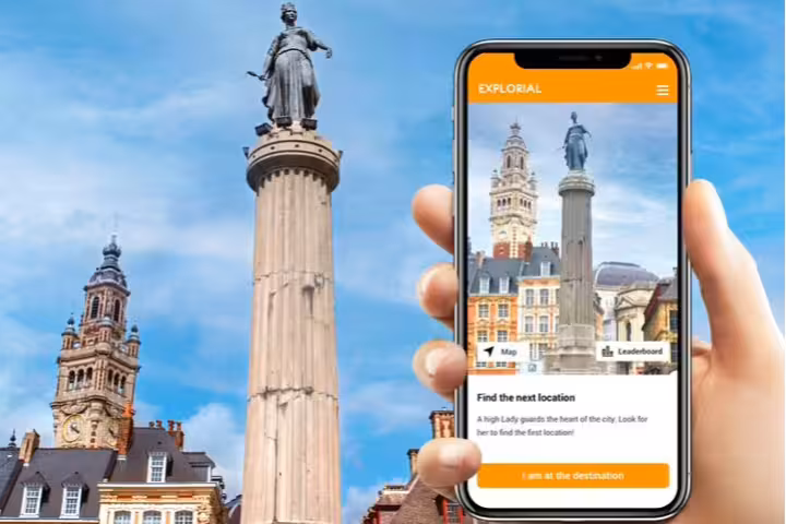 Smartphone app guiding a Lille scavenger hunt walking tour near the Goddess Column and Grand Place landmarks