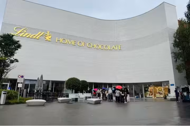 Lindt Home of Chocolate Museum entrance near Zurich, ideal for guided tour with hotel pickup and chocolate tasting