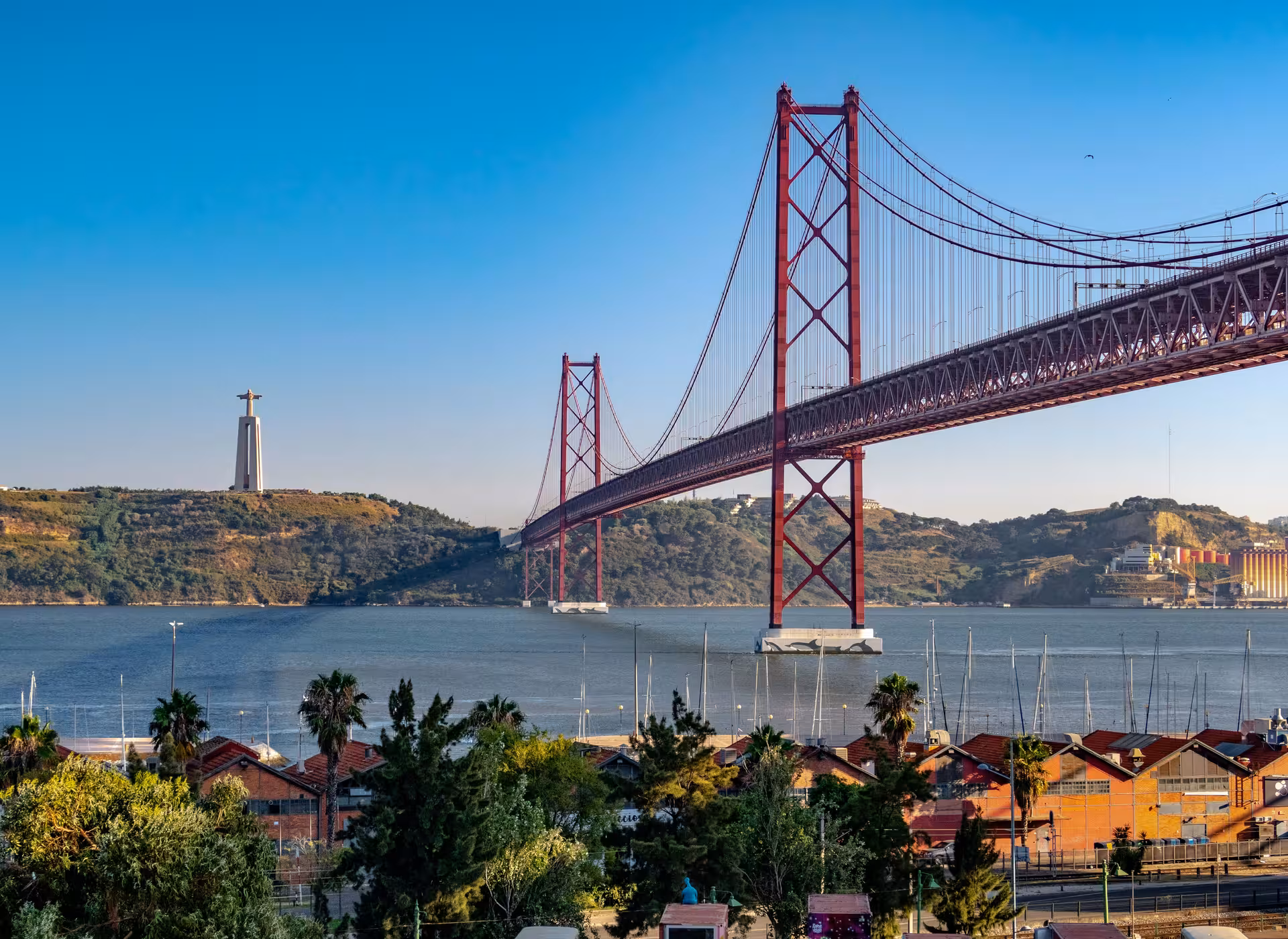 Scenic view of Ponte 25 de Abril suspension bridge over the Tagus River on a Lisbon e-bike tour