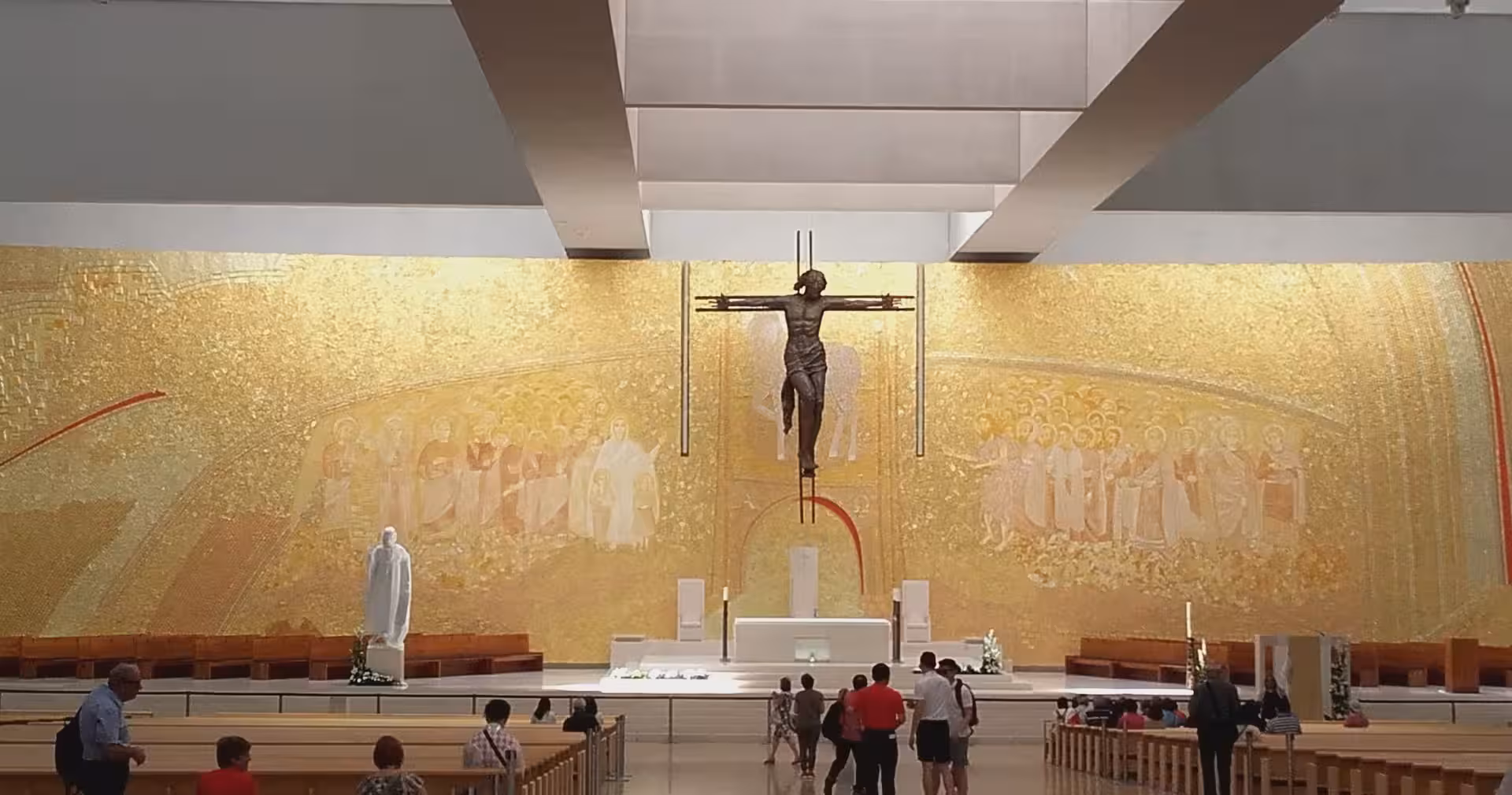 Interior of the Basilica of the Holy Trinity in Fátima with golden mosaic, visited on Lisbon half-day tour