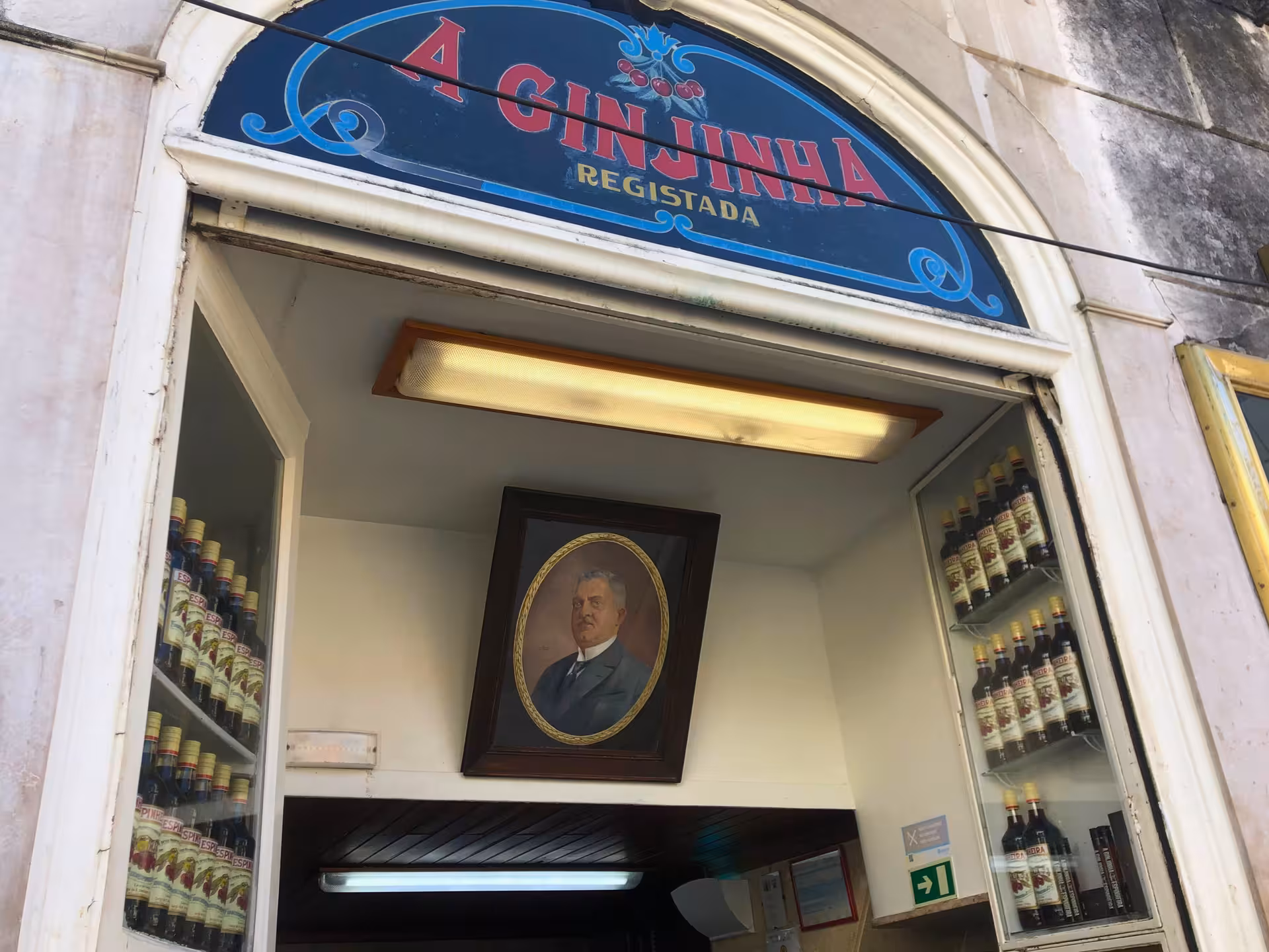 A Ginjinha Lisbon liqueur bar entrance, iconic stop on Old Shops, Traditions & Stories walking tour