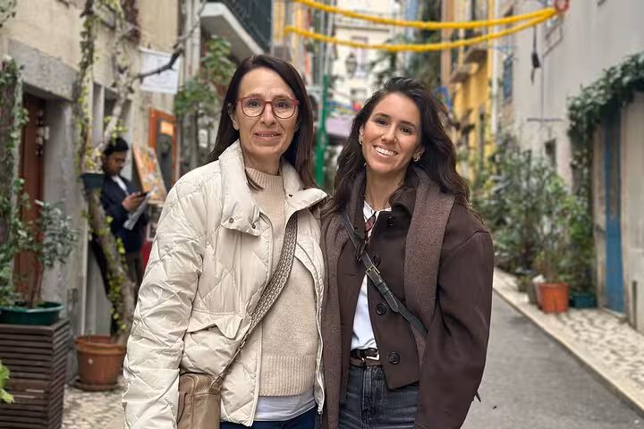 Explore Lisbon's charming streets with friendly locals, highlighting authentic experiences on a private tour.