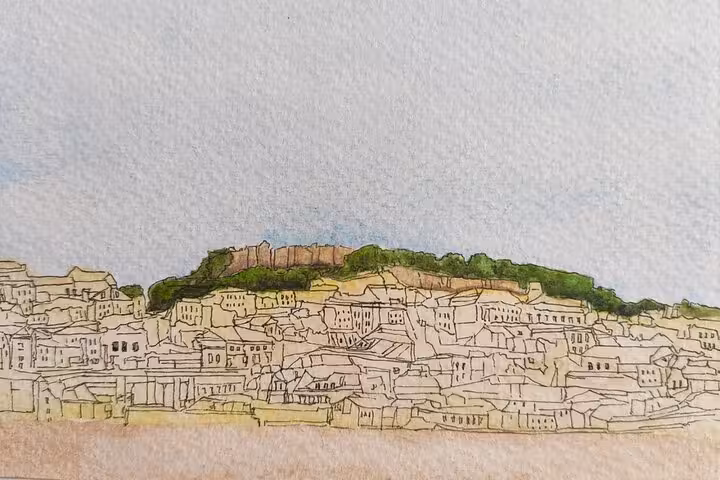 Ink and watercolor sketch of Lisbon hillside rooftops and castle ridge, ideal for a hidden views art walk
