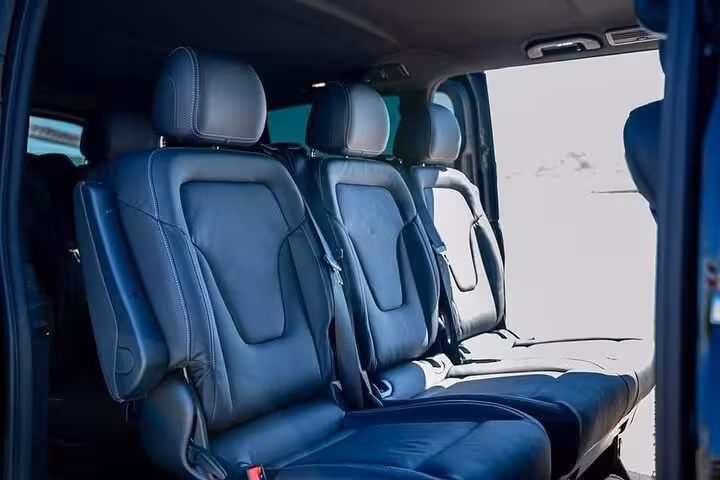 Spacious leather seating inside Mercedes for comfortable Lisbon to Seville private transfer journey.