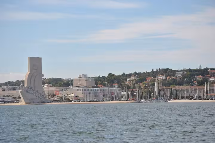 Lisbon Tagus River sailing cruise view of Monument to the Discoveries and Belem marina on 2h small group tour