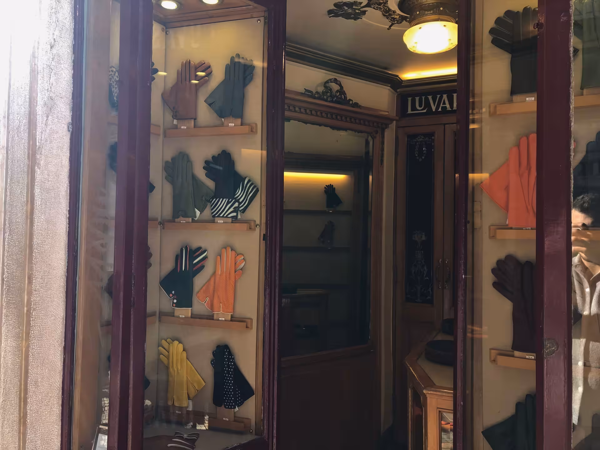 Traditional Lisbon glove shop window display, classic craftsmanship on Old Shops, Traditions & Stories tour
