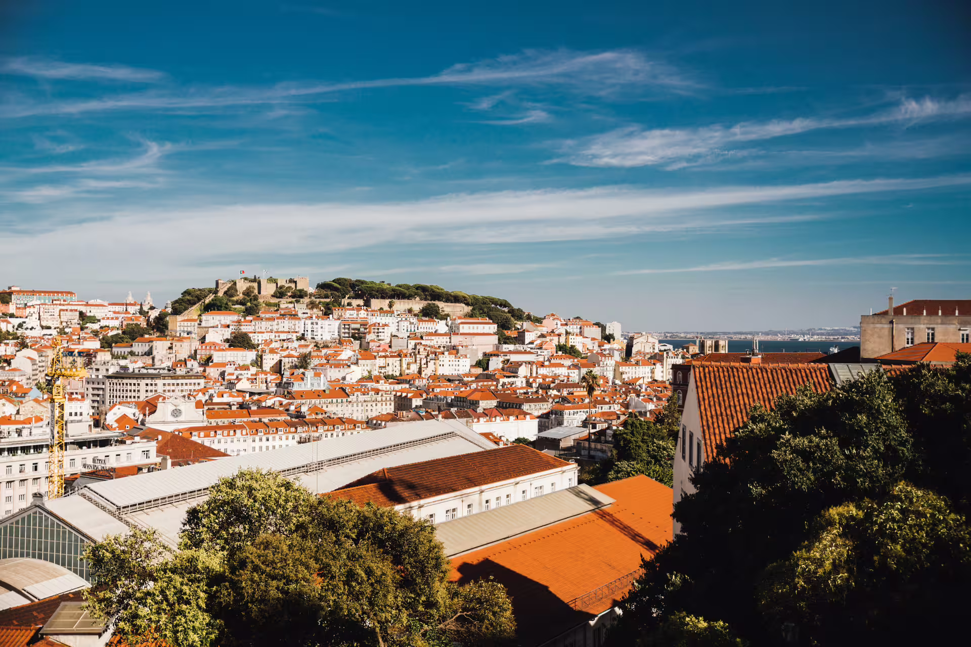 Enjoy panoramic views of Lisbon's cityscape and St. George's Castle on a full-day Tuktuk exploration tour.