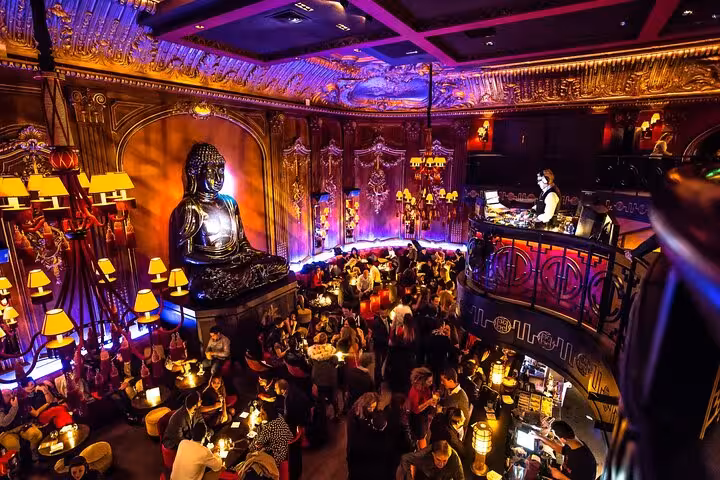 Little Buddha Hurghada club interior with DJ balcony and Buddha statue, night out entrance and transport tour