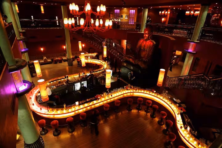 Little Buddha Hurghada interior with glowing bar and lounge seating, night out tour with entrance and transport