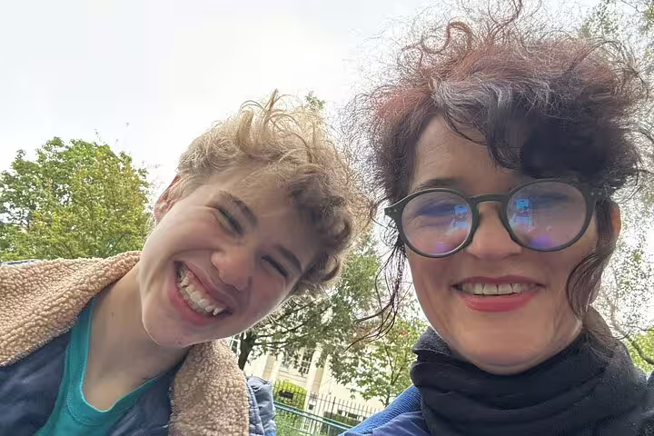 Two smiling women taking a selfie outdoors near Little Venice London on a walking tour