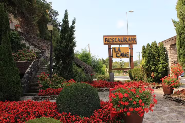 Loire Valley restaurant entrance with flowers, lunch stop on the Loire castles tour and vineyard visit