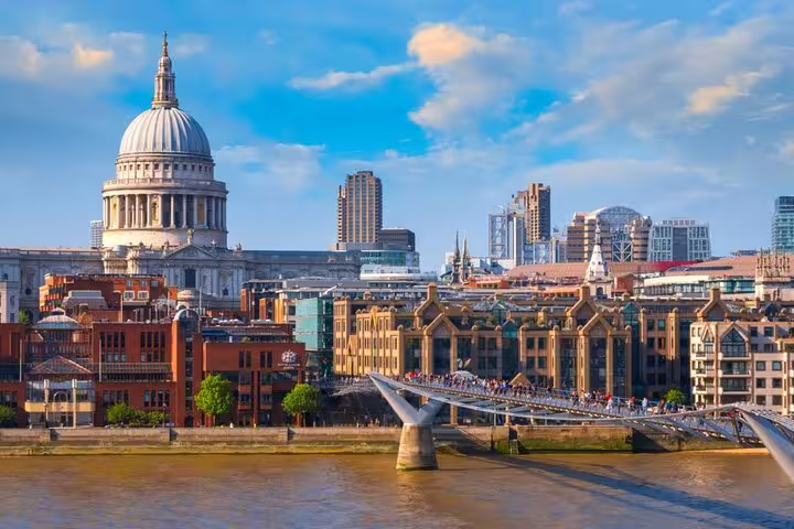 St Paul's Cathedral and Millennium Bridge over the Thames in London on a sunny day