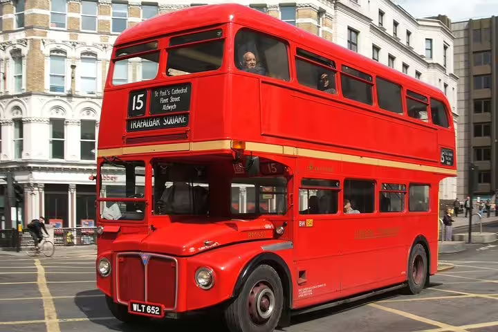 Iconic red double-decker bus in London, perfect for exploring landmarks like the Tower of London on a private skip-the-line tour.
