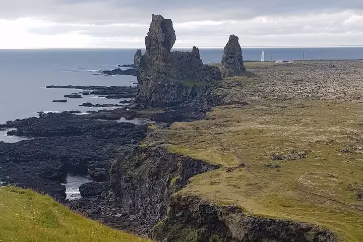 Dramatic sea stacks and rocky coastline at Lóndrangar cliffs on the Snæfellsnes Peninsula, Iceland