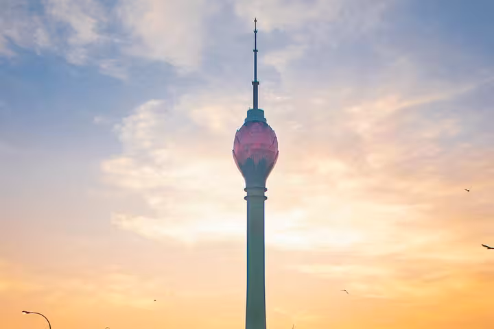 Lotus Tower in Colombo at sunset, a top stop on a Colombo city tuk tuk sightseeing tour in Sri Lanka