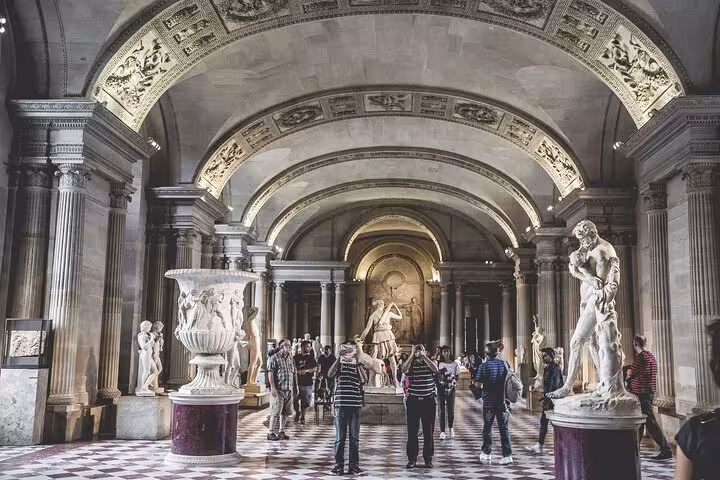 Louvre Museum gallery in Paris on private tour with skip-the-line access after luxury Eiffel Tower lunch and Seine cruise
