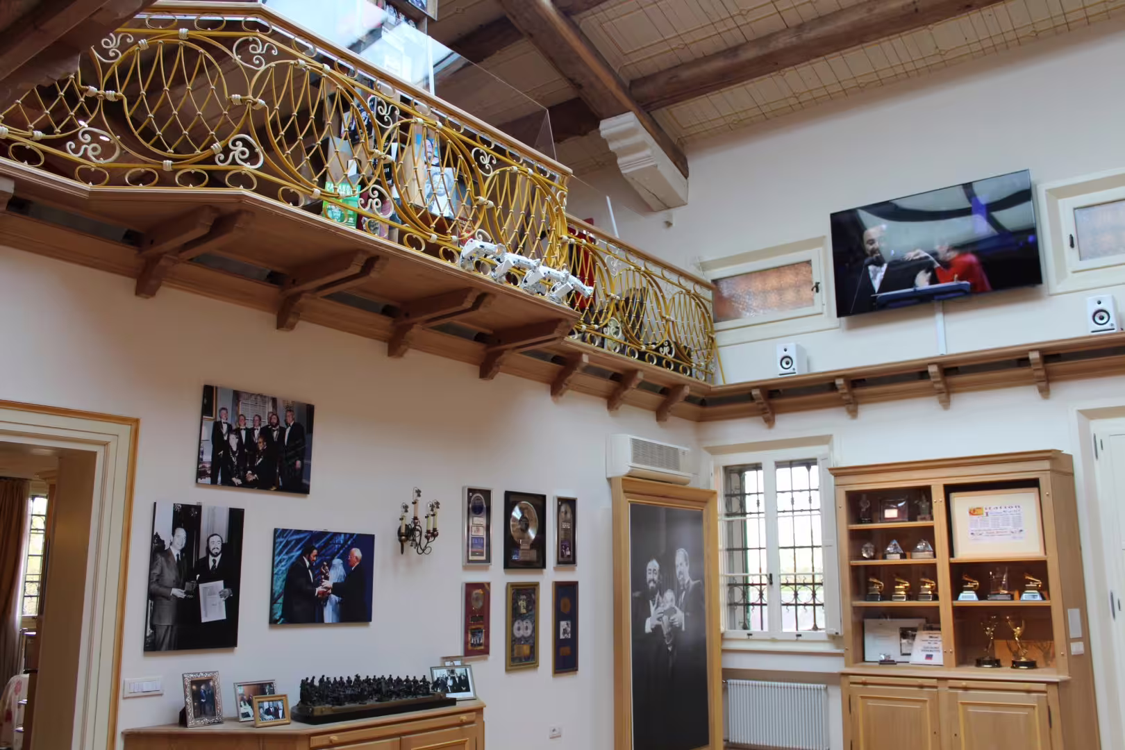 Interior of Luciano Pavarotti House Museum in Modena with awards, photos and memorabilia, entrance ticket tour highlight
