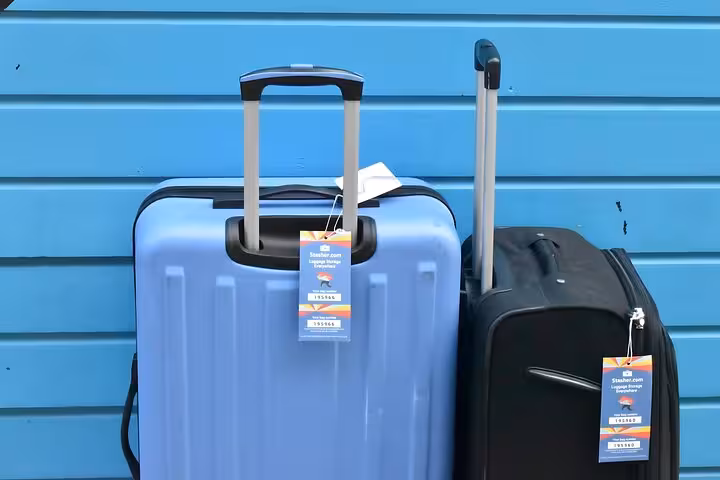 Suitcases with Stasher tags, secure luggage storage near Milan Central Station for day trips