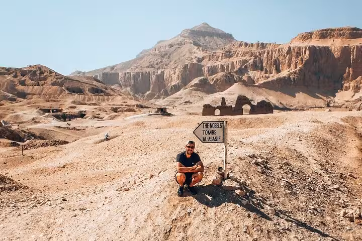 Luxor bike rental stop at Nobles Tombs Al-Asasif on the West Bank desert trail, perfect for independent touring