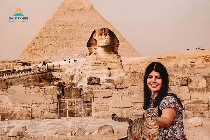 Visitor near Great Sphinx and Giza Pyramid on Luxor to Cairo day tour by flight, Egypt Pyramids tour