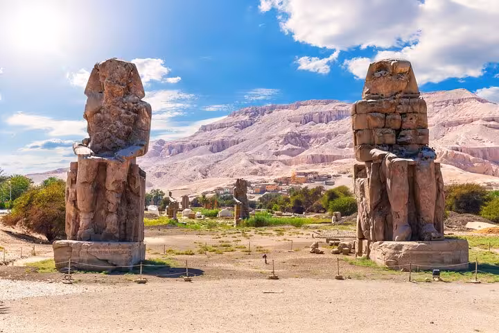 Colossi of Memnon statues in Thebes on Luxor highlights and King Tut tomb tour from Hurghada with lunch