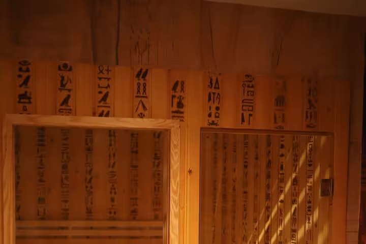 Warm sauna room with Egyptian-inspired decor at Luxor hammam spa, included in 2-hour relaxation package