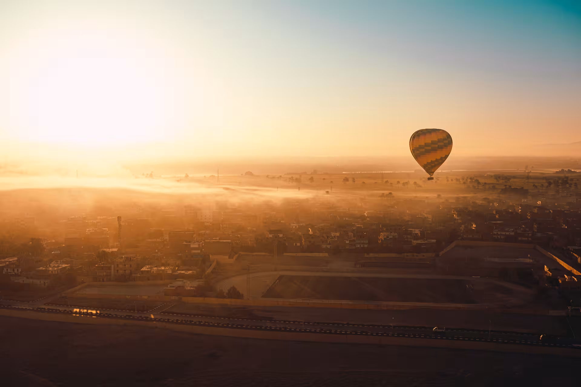 Sunrise hot air balloon over Luxor on an 8-day budget Egypt tour from Cairo to Aswan and Abu Simbel