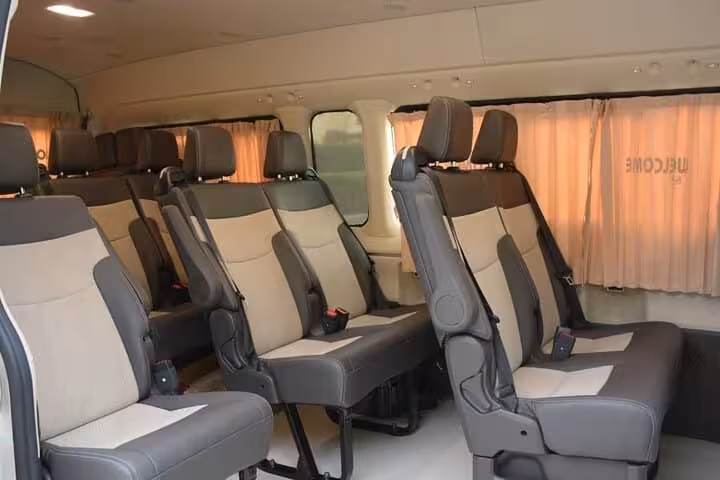 Spacious air-conditioned minibus interior for safe private transfer from Luxor to Hurghada with comfy seats