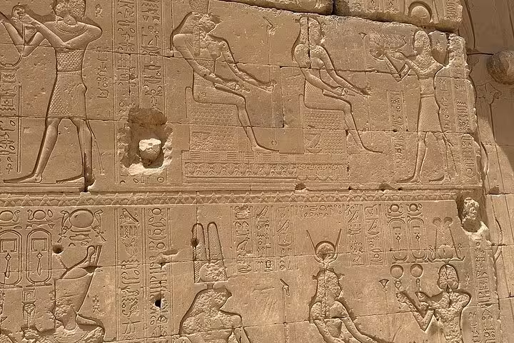 Marvel at the ancient hieroglyphs and stone carvings telling stories of Egyptian royalty in Luxor.