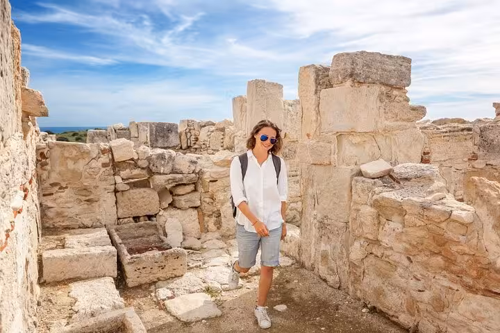 Tourist walking through Karnak Temple ruins in Luxor on a 2-day Hurghada trip with hotel and Nile boat