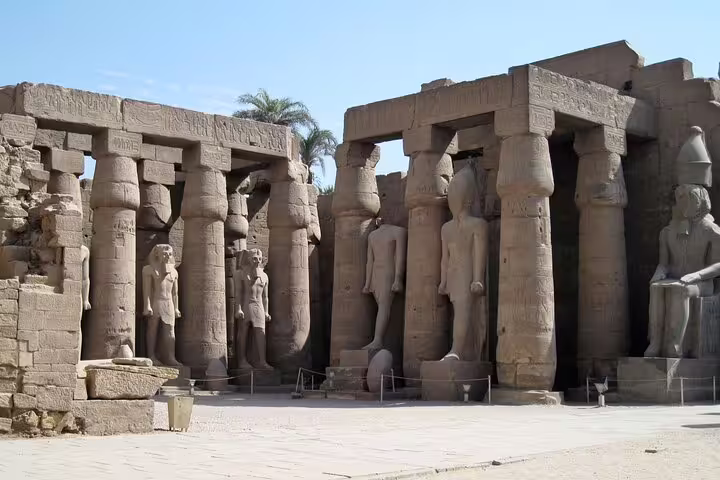 Luxor Karnak Temple hypostyle hall columns and statues, guided day trip by plane from Sharm El Sheikh