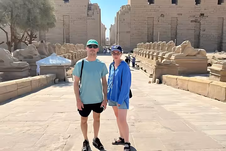 Couple at Luxor Karnak Temple avenue of sphinxes on Hurghada day trip, Luxor highlights with lunch