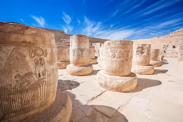 Carved stone columns and hieroglyphs in Luxor, part of Marsa Alam excursion to Karnak Temples and tombs