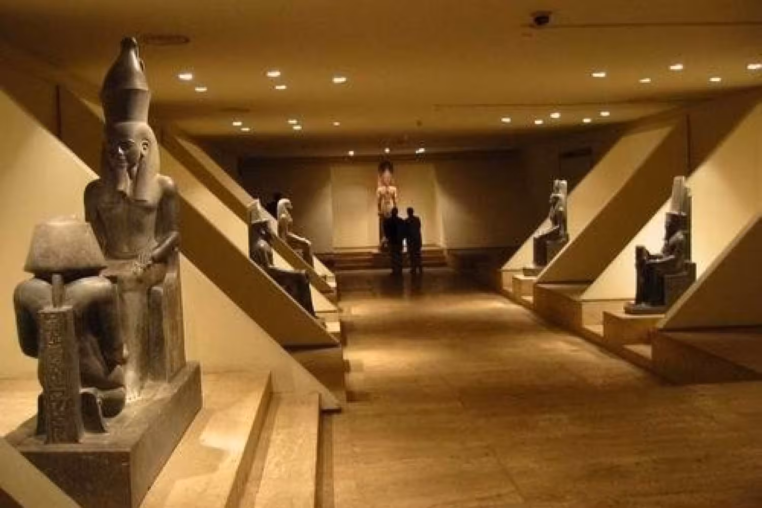 Interior of Luxor Museum with seated statues and central hall, part of the Discover Luxor Museum guided tour