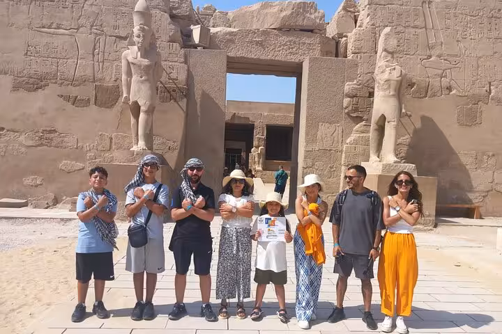 Tour group at Luxor Temple entrance on Sharm El Sheikh day trip by plane, Egypt sightseeing and guide