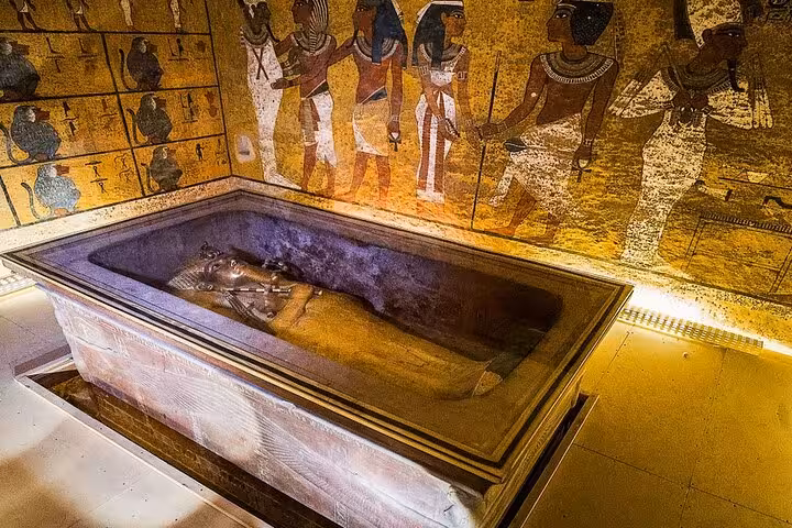 Ancient Egyptian sarcophagus inside a Luxor tomb, Valley of the Kings on Cairo to Luxor flight day tour