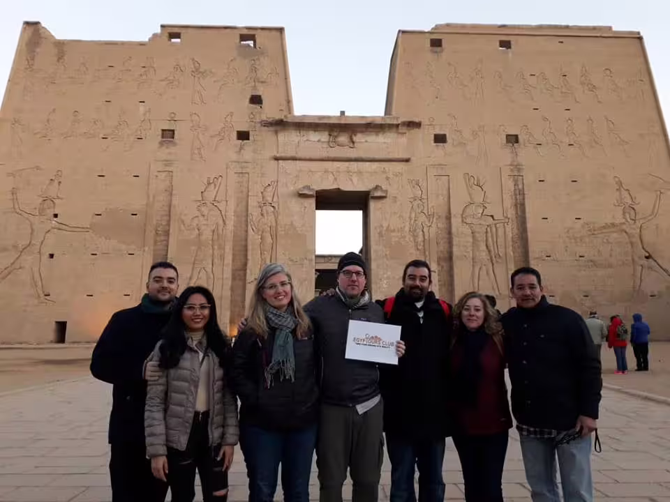 Private Luxor tour group at Medinet Habu Temple entrance, 2-night sleeper train trip from Cairo