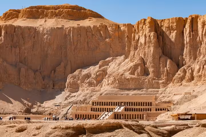 Deir el-Bahari Hatshepsut Temple framed by desert cliffs, Luxor highlights tour from Hurghada with lunch