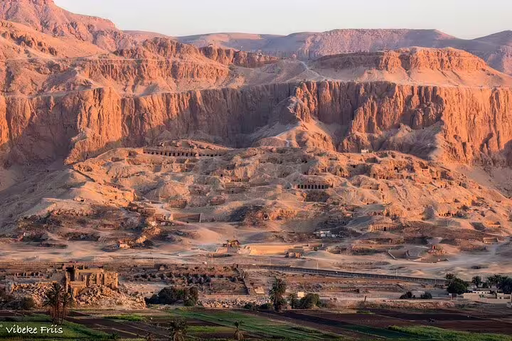 Sunset view over Luxor’s Valley of the Kings desert cliffs, part of 3 nights 2 days Cairo to Luxor sleeper train tour