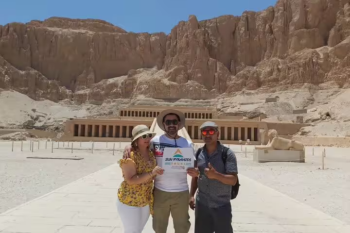 Guided Luxor West Bank day trip photo at Hatshepsut Temple, Deir el-Bahari, with desert mountains backdrop