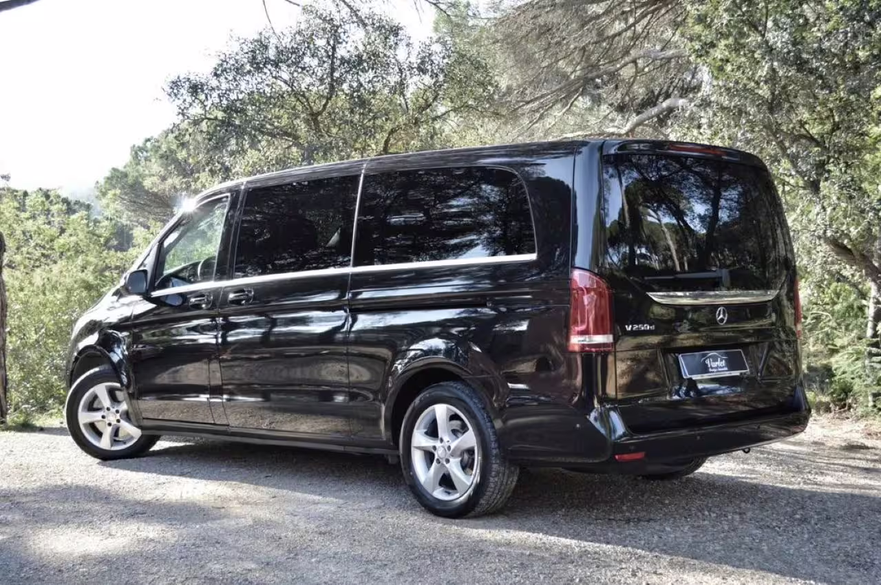 Travel in luxury with our sleek black van for customized transfers from Lisbon to the Algarve.