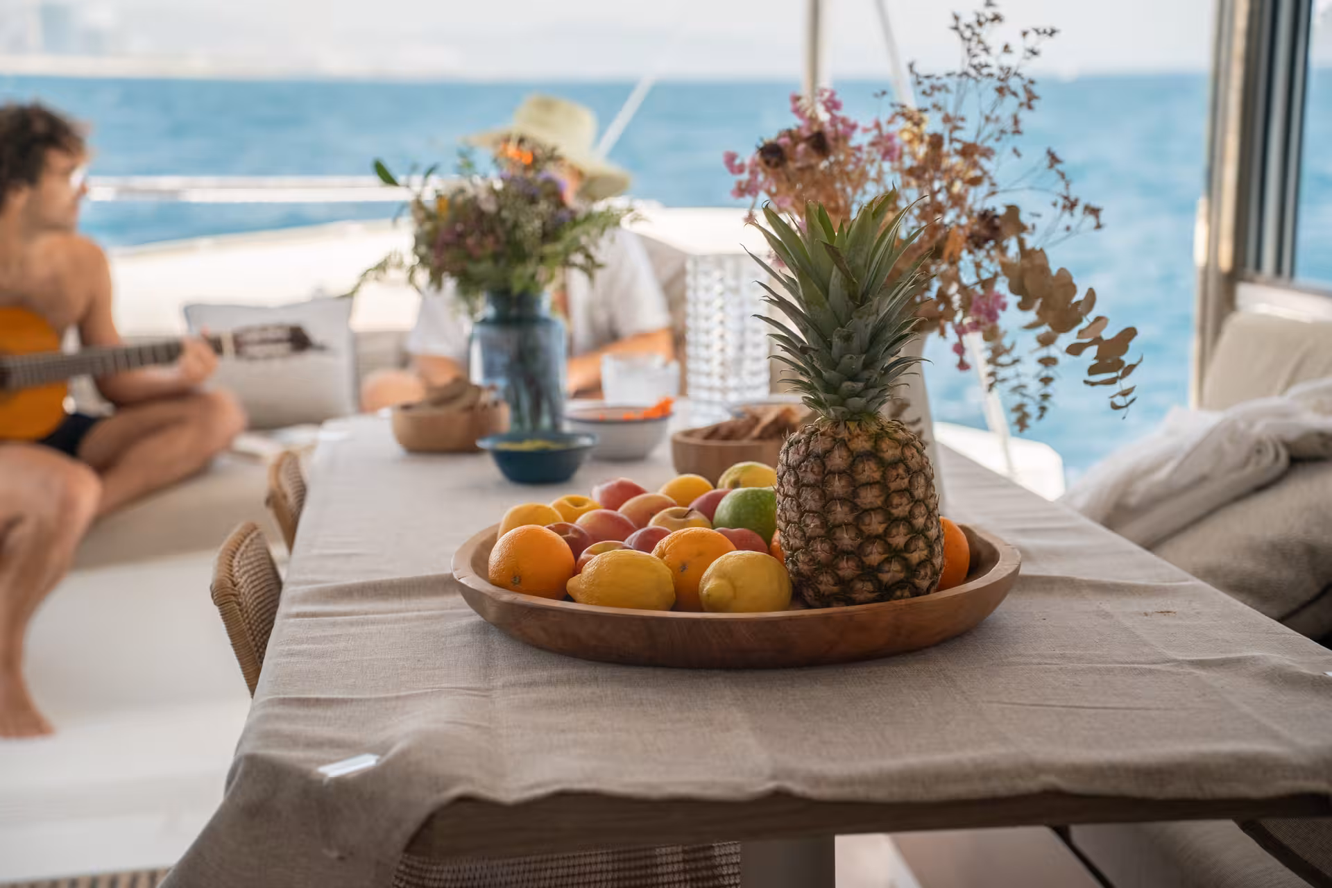 Fresh fruit table and onboard dining on a 2-hour private luxury catamaran Barcelona Bali 4.2 Mediterranean cruise