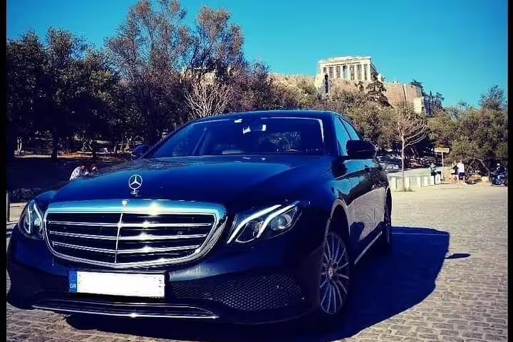 Luxury Mercedes sedan for private airport welcome transfer service, ideal for VIP arrivals and city rides