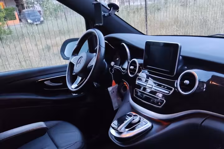 Luxury Mercedes interior for private transfer from Athens Airport to Piraeus Port hotel with leather seats