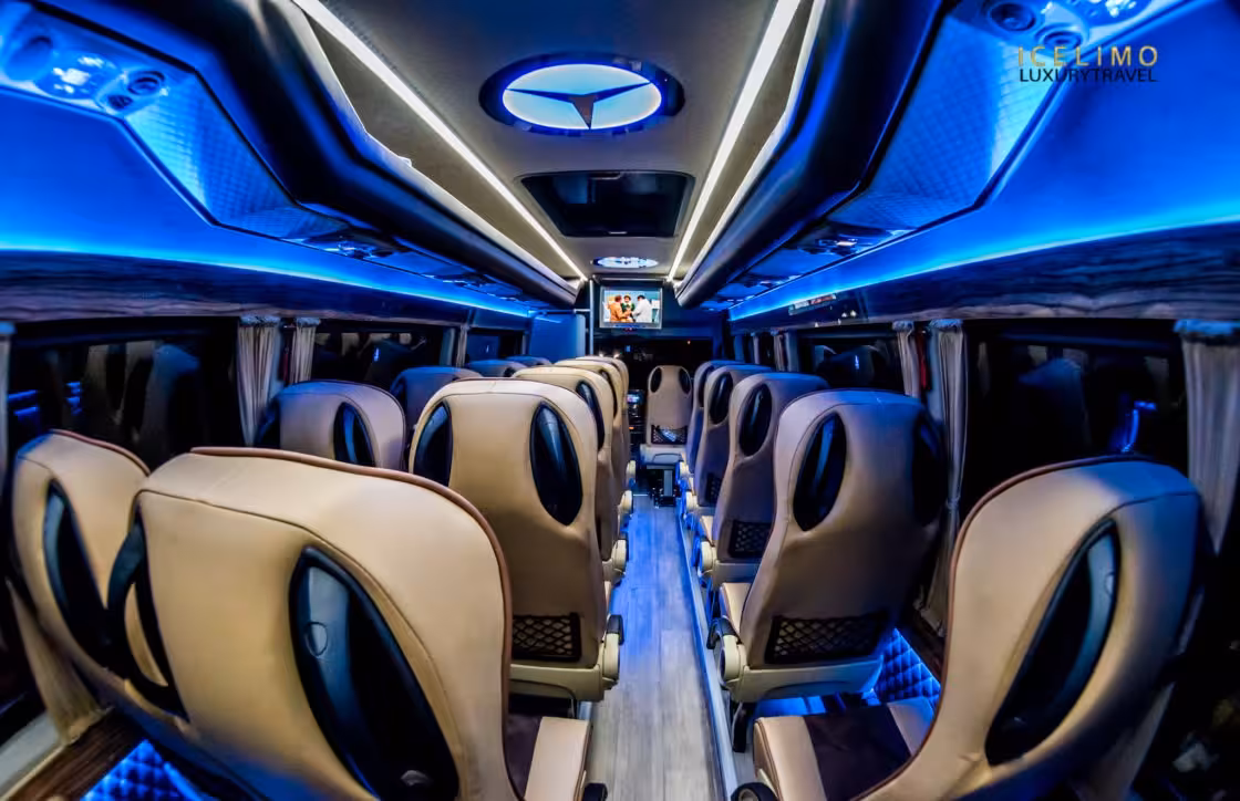 Luxury Mercedes minibus interior with leather seats and blue LED lighting for Iceland South Coast private full-day tour
