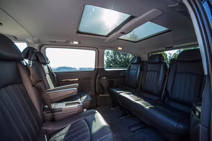 Luxury minivan interior with leather seats for Ancient Corinth Epidaurus Nafplio full-day private tour