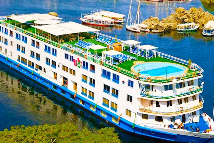 Luxury Nile cruise ship with sun deck pool sailing from Luxor to Aswan on a 5-day 4-night Egypt tour
