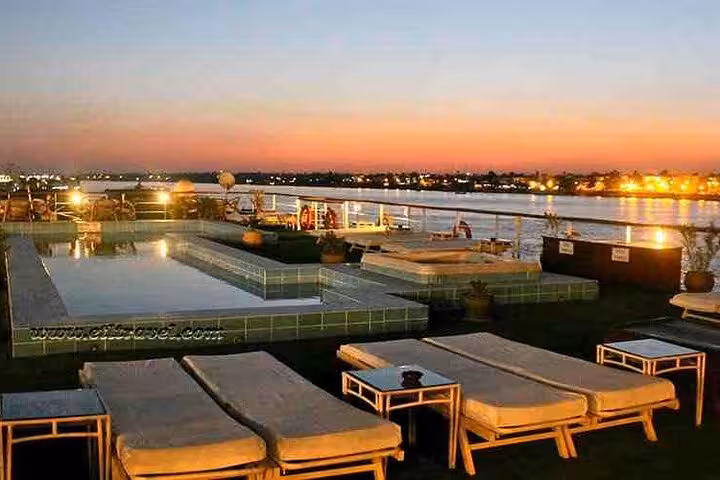 Sunset rooftop pool and loungers on luxury Nile cruise, 5-day private tour from Luxor to Aswan